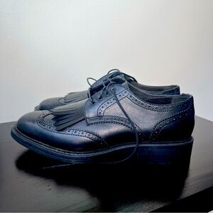 Black leather lace up shoes. Unworn